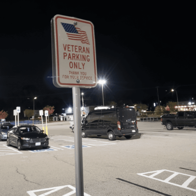 A parking lot at night.