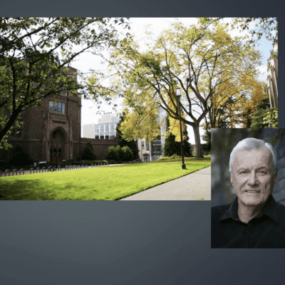 An image of a man standing in front of a building.