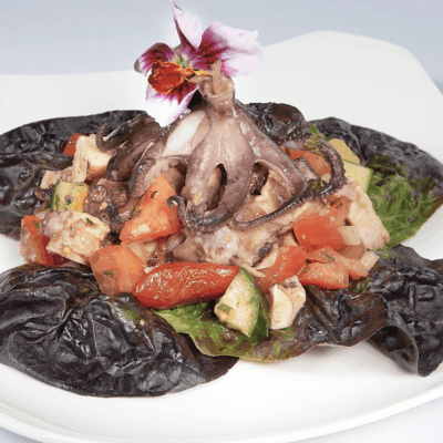 A flower-adorned octopus dish.