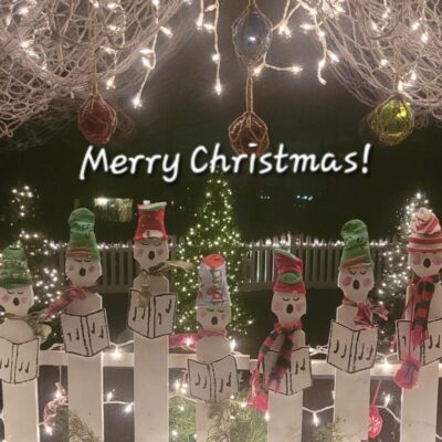 Merry Christmas snowmen on a fence featuring Michael Morse.