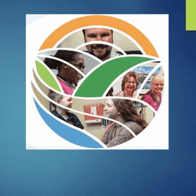 An image of a group of people from Wood River Health in a circle.