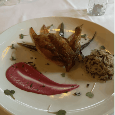 A white plate with recipes-inspired food on it.