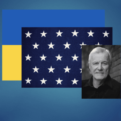 A photo of a man with a Ukrainian flag.