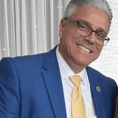 A man and woman posing for a photo in East Providence, RI.