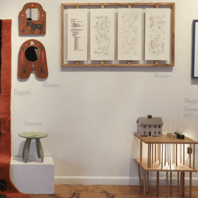 A room with a variety of art objects on display.