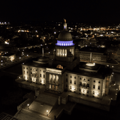 An aerial view of a building at night, captured by Chris Herren.