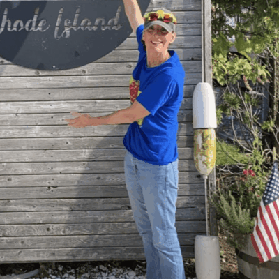 Woman in Rhode Island, near buoy.