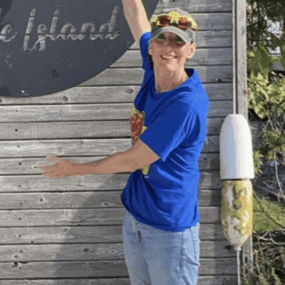 Woman in blue shirt at Rhode Island.