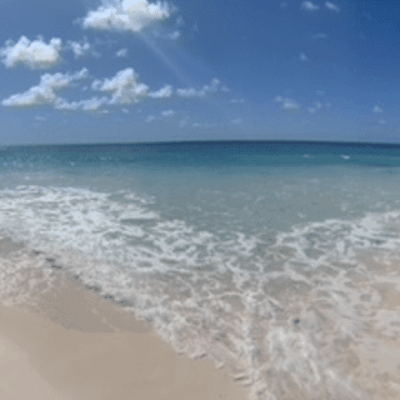 White sand beach with turquoise water.