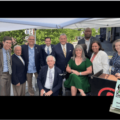 Group photo celebrating accessibility progress.