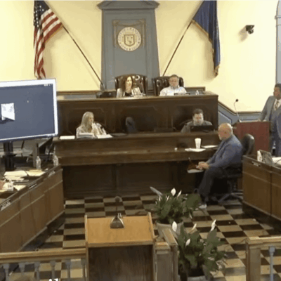 Town council meeting in session.