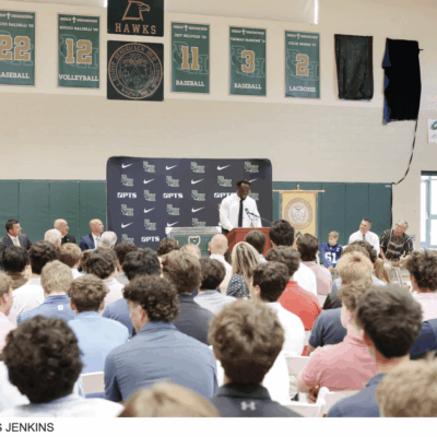 Speaker addressing high school students.