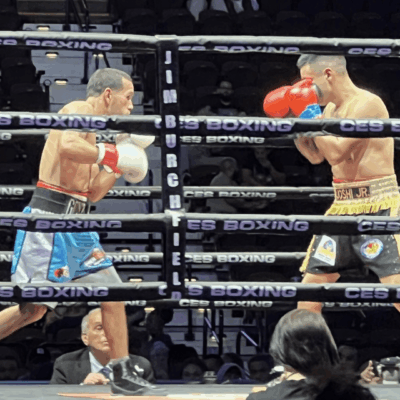 Two boxers facing off in the ring.