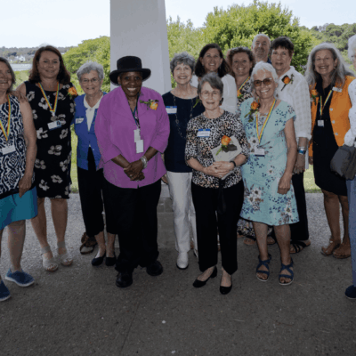 Group of women at an awards ceremony.