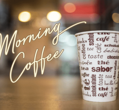 Morning coffee in a paper cup.