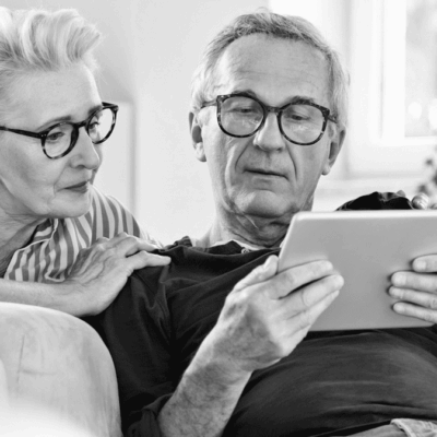 Senior couple using tablet together.