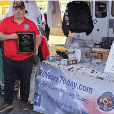 Veteran receiving Columbus Day award.