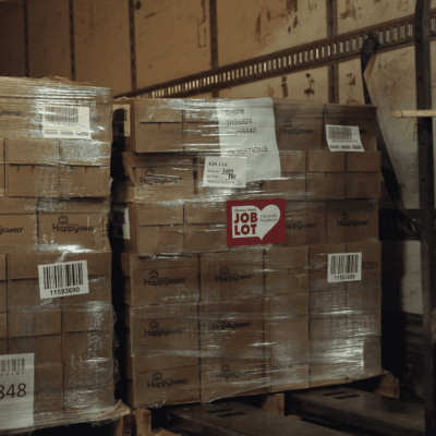 Pallet of HappyFamily donations.