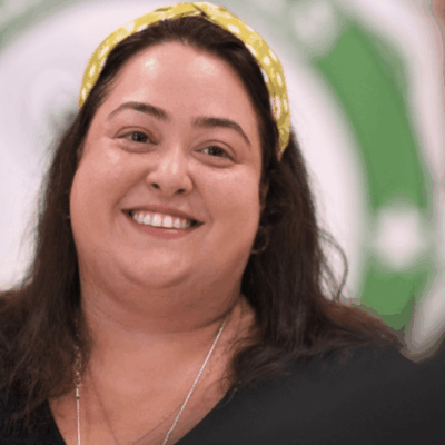 Smiling woman wearing a headband.