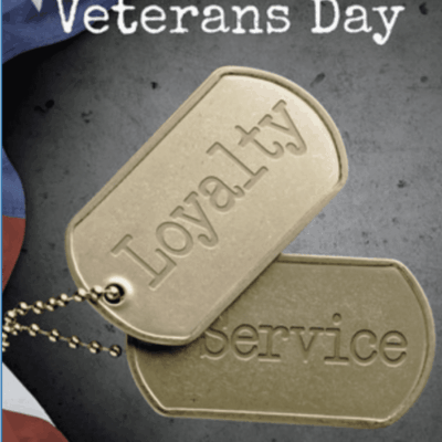 A pair of dog tags with the words loyalty and service on them.