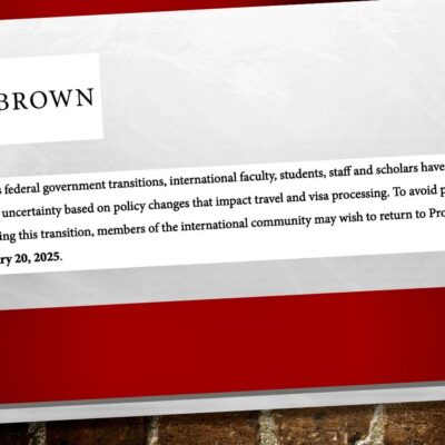 A red and white sign with the word " brown ".