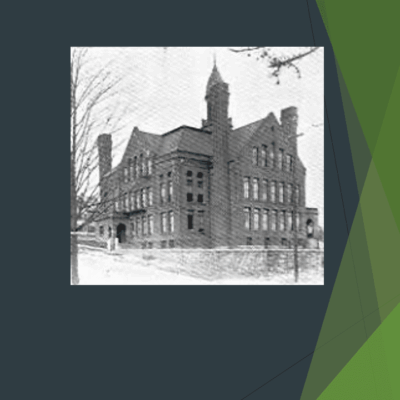 A black and white photo of an old building.