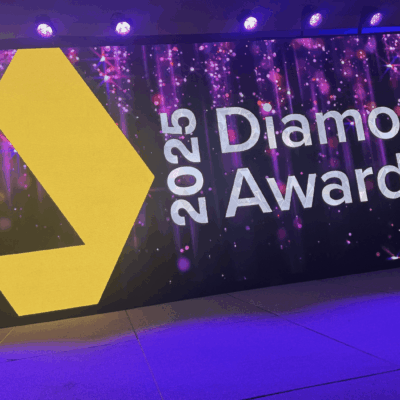 2025 Diamond Awards banner with lights.