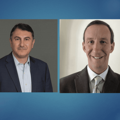 Two professional men in suits posing for headshots.