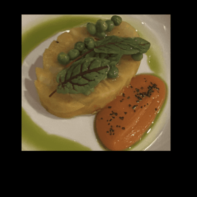 Gourmet dish with fish, asparagus, and a side of seasoned mashed sweet potatoes.