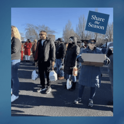 People marching outdoors holding signs for safe streets.