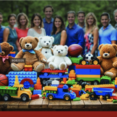 A group of women standing behind teddy bears and toy trains outdoors.
