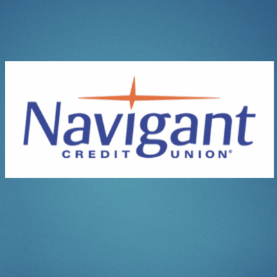 Logo of Navigant Credit Union with blue text and orange star.