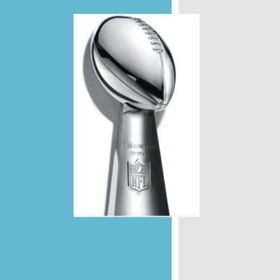 Shiny Vince Lombardi Trophy on a blue and white background.