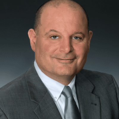 Christopher Ottiano, M.D., is the interim chief medical officer at Neighborhood Health Plan of Rhode Island