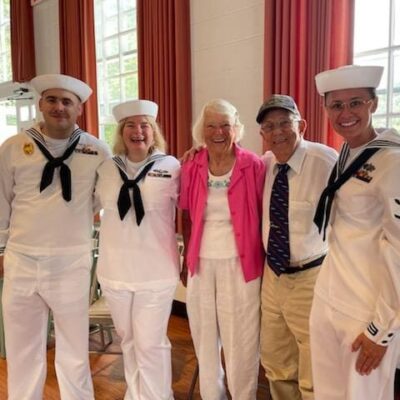 A group of sailors posing for a photo.