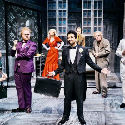 A group of people standing on a stage.