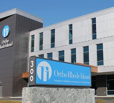 A building with a sign that says olympic blood hospital.