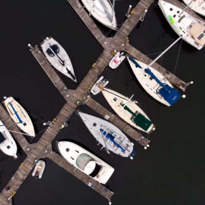 Aerial view of boats docked at marina.