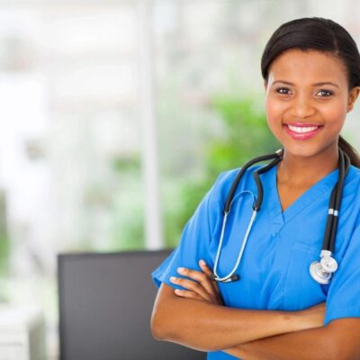 Smiling female nurse with stethoscope.
