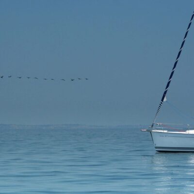 A boat floating on top of the ocean.