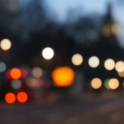 A blurry image of a city at night.