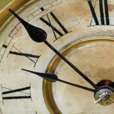 A clock with roman numerals on it.