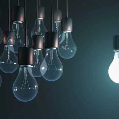 Here's an alt tag for the image: Bright idea among many dim bulbs.