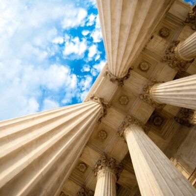 A view of the pillars of the supreme court in washington, dc.