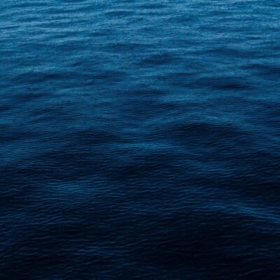 An image of a blue ocean with waves.