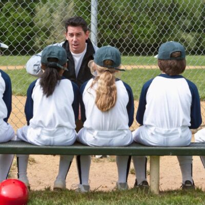 A group of baseball players sitting on a bench.