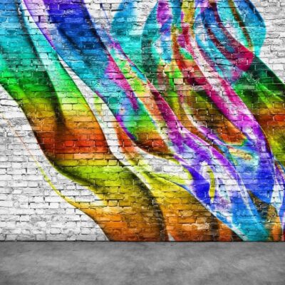 Colorful graffiti on brick wall.