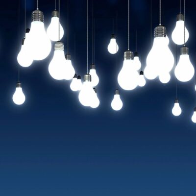 A group of light bulbs hanging from the ceiling.