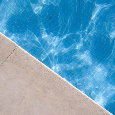 Blue water in a swimming pool.