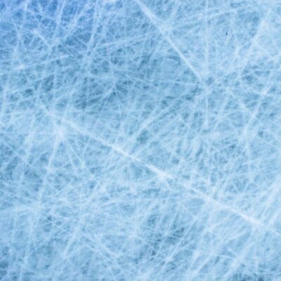 Scratched ice surface texture background.